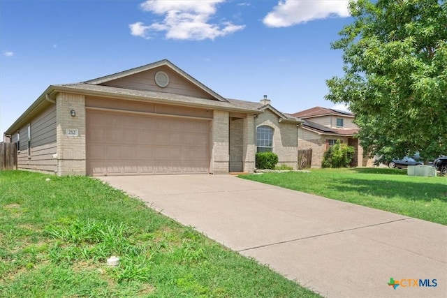 212 Nairm Ln, Temple, TX 76502 - ranch-style home with an attached garage, brick siding, driveway, and a front lawn