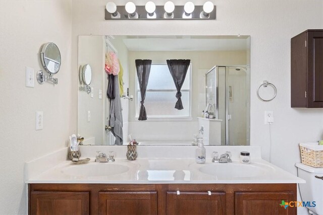 212 Nairm Ln, Temple, TX 76502 - bathroom featuring a shower stall and double vanity