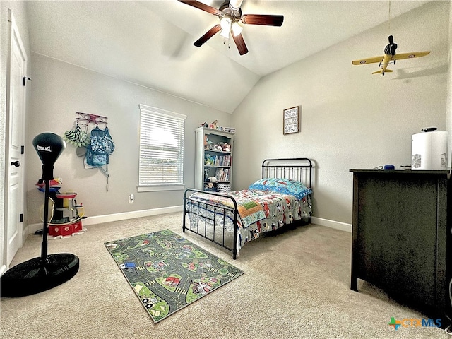 carpeted bedroom with lofted ceiling and ceiling fan