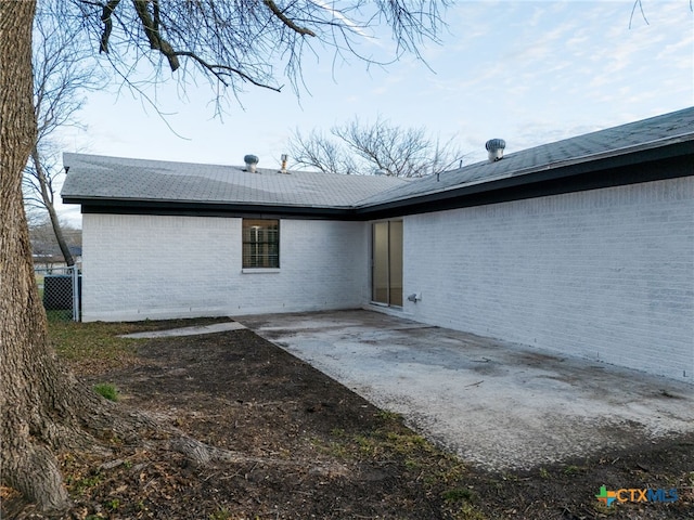 rear view of house with a patio area