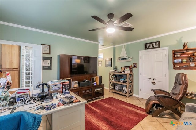 tiled living room with ceiling fan and crown molding