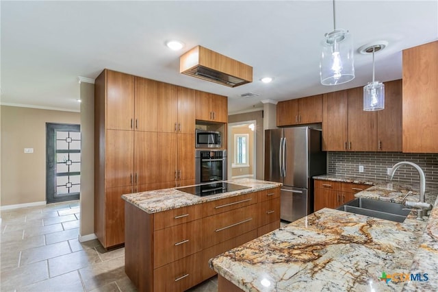 kitchen with a center island, a sink, brown cabinetry, appliances with stainless steel finishes, and ornamental molding