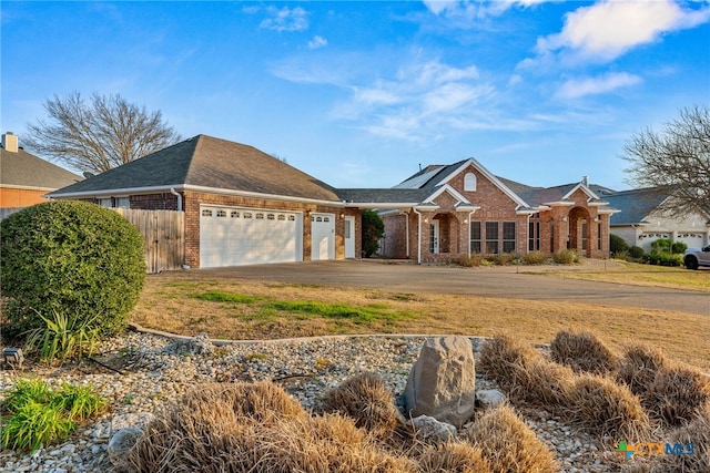 single story home featuring a garage