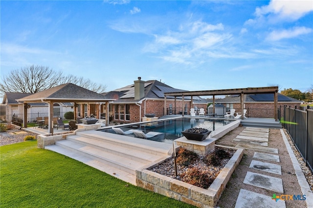 view of swimming pool with a gazebo, a patio, and a lawn