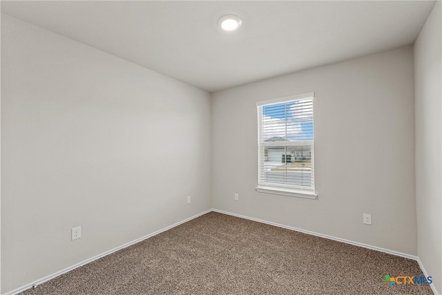 unfurnished room featuring carpet floors