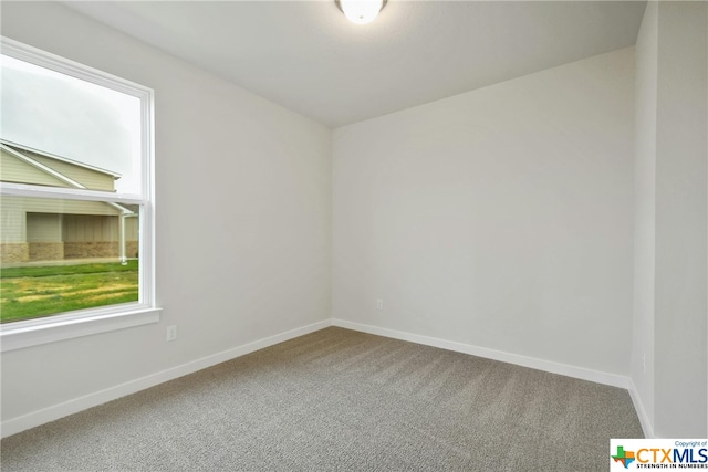 view of carpeted spare room