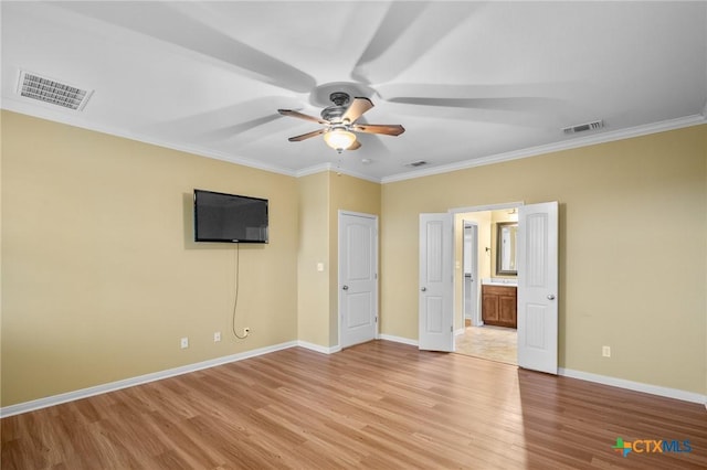 unfurnished bedroom featuring ornamental molding, connected bathroom, ceiling fan, and light hardwood / wood-style floors