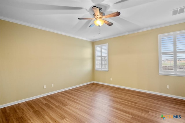 unfurnished room featuring ceiling fan, ornamental molding, and light hardwood / wood-style flooring