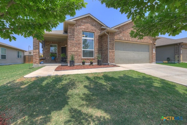 471 Copper Hill Dr, New Braunfels, TX 78130 - view of front facade featuring a garage, driveway, brick siding, and a front yard