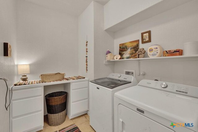 471 Copper Hill Dr, New Braunfels, TX 78130 - laundry area featuring separate washer and dryer and light tile patterned flooring