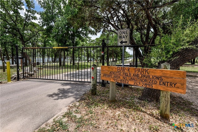 exterior space with a gate