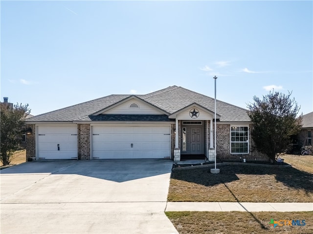 ranch-style home with a garage