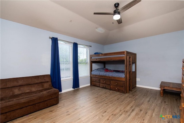 5516 Birmingham Cir, Killeen, TX 76542 - bedroom featuring wood finished floors, vaulted ceiling, and a ceiling fan