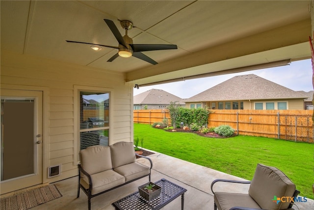 view of patio featuring outdoor lounge area and ceiling fan