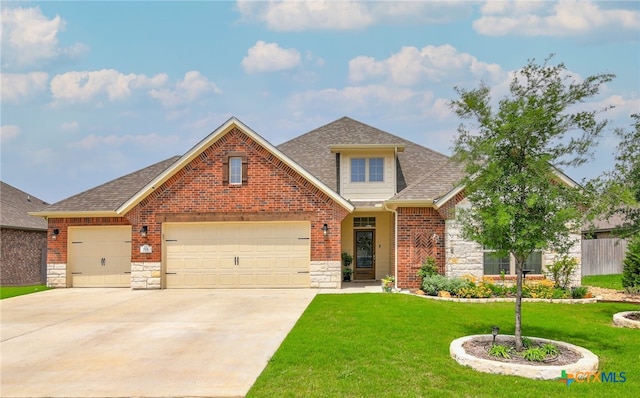 craftsman house featuring a garage and a front lawn