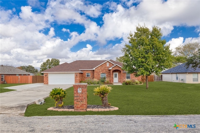 ranch-style home with a front yard and a garage