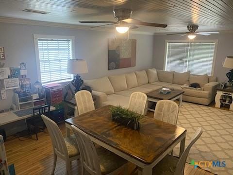 319 W Village Rd, Salado, TX 76571 - dining area featuring ceiling fan, crown molding, and light wood-style flooring