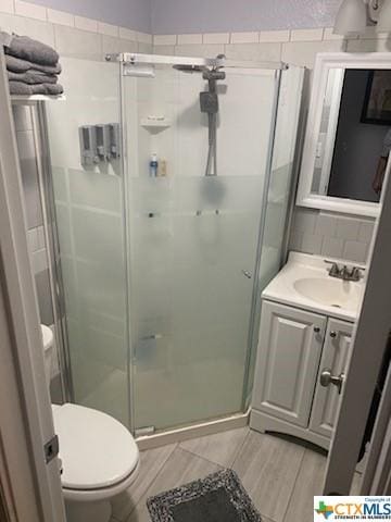 319 W Village Rd, Salado, TX 76571 - full bath featuring toilet, a shower stall, and vanity