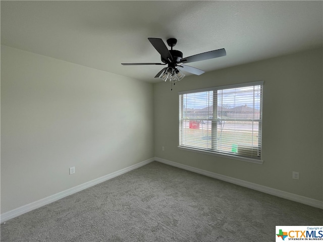 unfurnished room featuring carpet flooring and ceiling fan