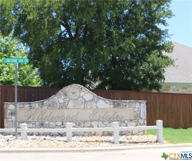 view of community sign