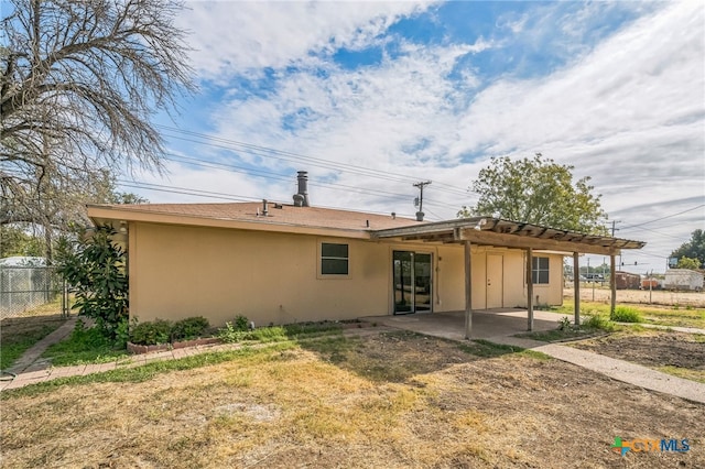 rear view of house featuring a patio area