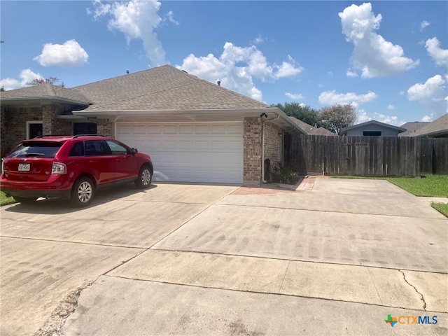 view of side of property featuring a garage