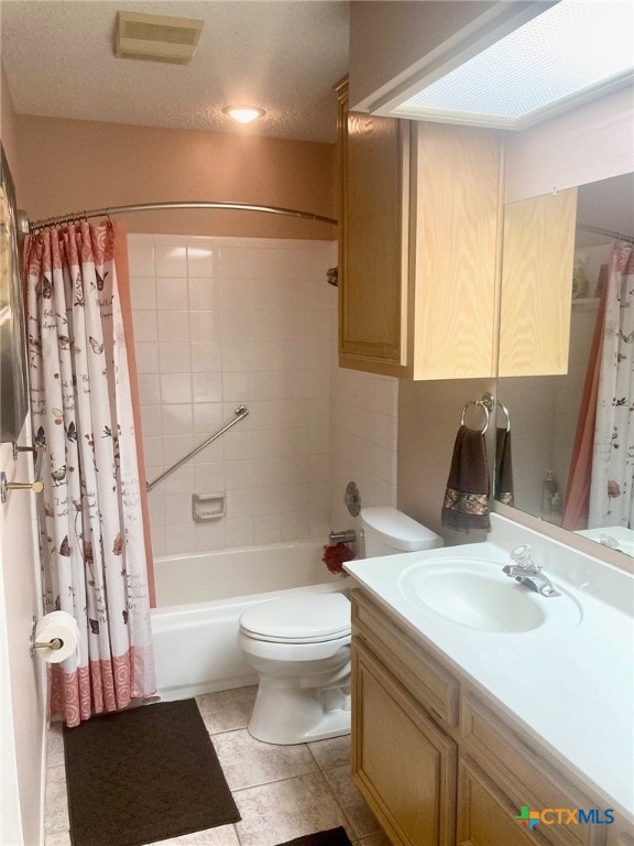 full bathroom with toilet, a textured ceiling, vanity, shower / bathtub combination with curtain, and tile patterned flooring