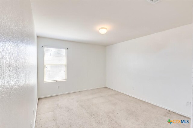 3802 Endicott Dr, Killeen, TX 76549 - carpeted spare room with baseboards