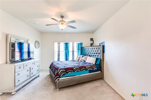 3802 Endicott Dr, Killeen, TX 76549 - bedroom with light colored carpet and a ceiling fan