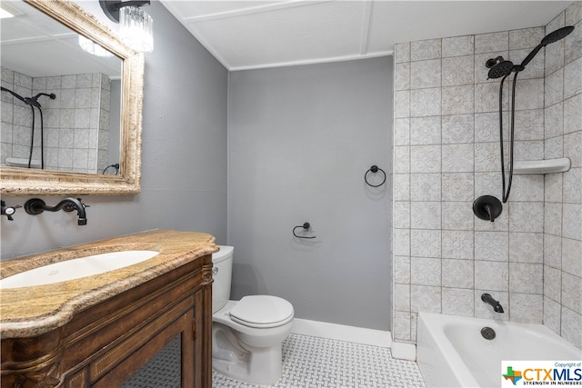 full bathroom with vanity, tile patterned flooring, toilet, and tiled shower / bath