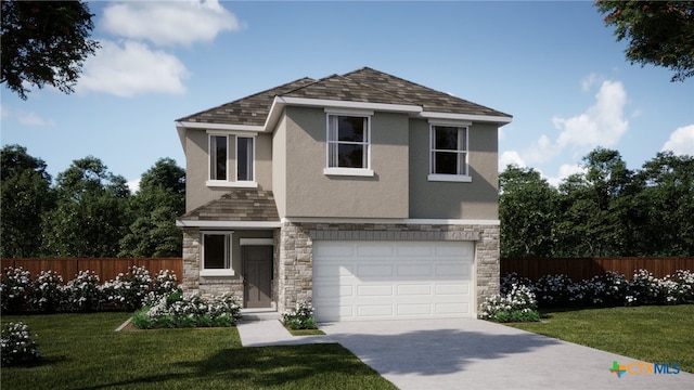 view of front of property featuring a garage and a front yard