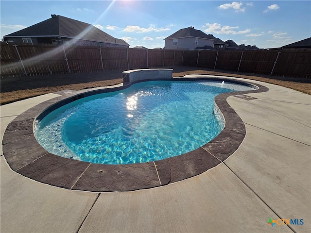 view of pool with a patio area