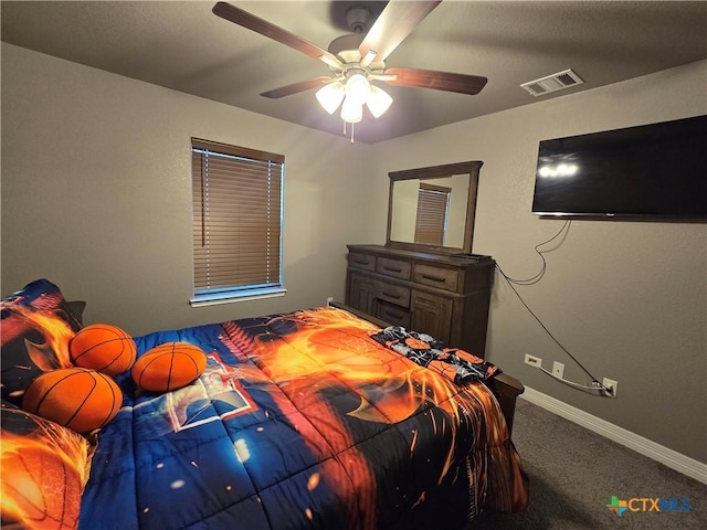 carpeted bedroom with ceiling fan