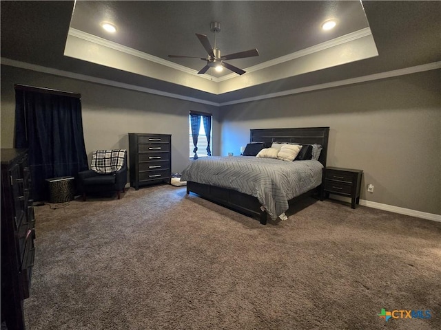 carpeted bedroom featuring a raised ceiling, ceiling fan, and crown molding