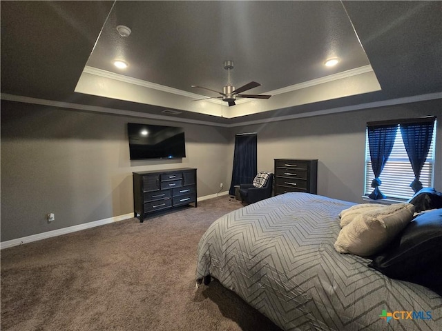 bedroom featuring carpet, ornamental molding, and a raised ceiling