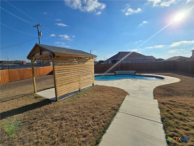 view of yard featuring a fenced in pool and a patio