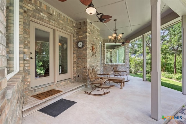 view of patio featuring ceiling fan and a porch