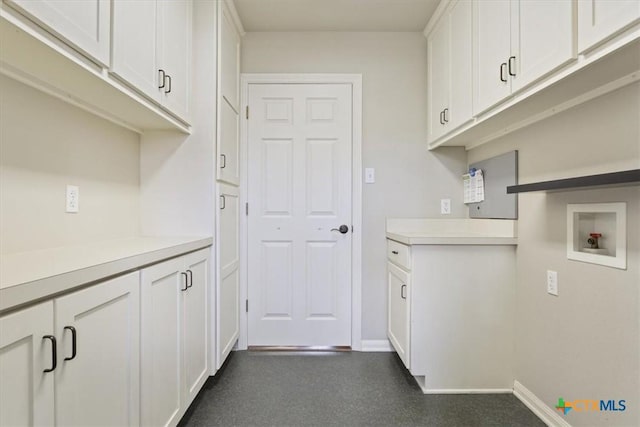 kitchen with white cabinets