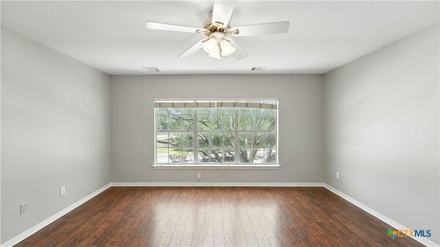 unfurnished room with wood finished floors and ceiling fan