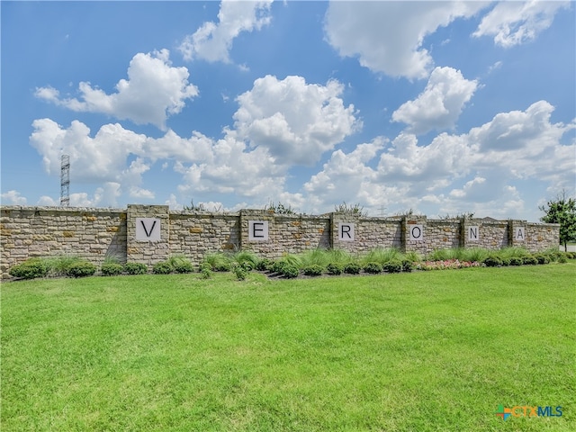 view of community with a lawn