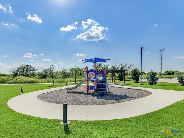 view of jungle gym with a yard