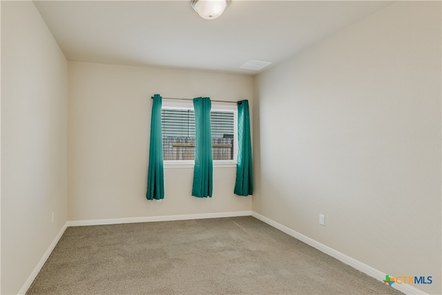 empty room featuring carpet