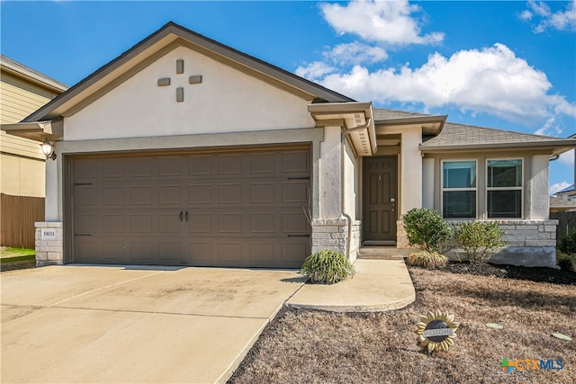 ranch-style home featuring a garage