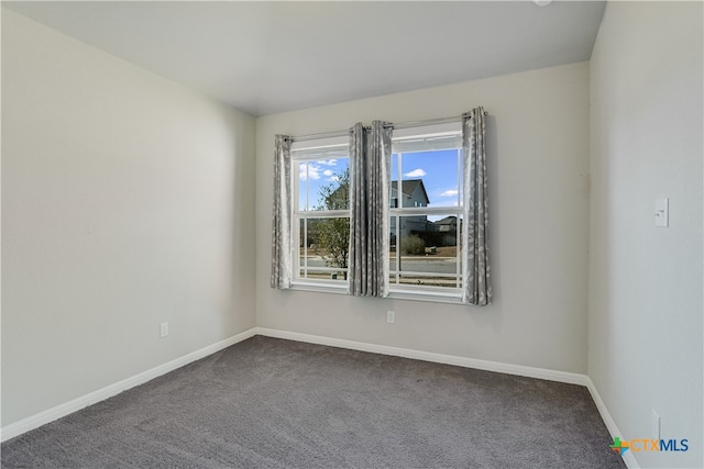 view of carpeted spare room