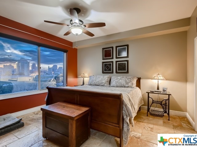 bedroom featuring ceiling fan