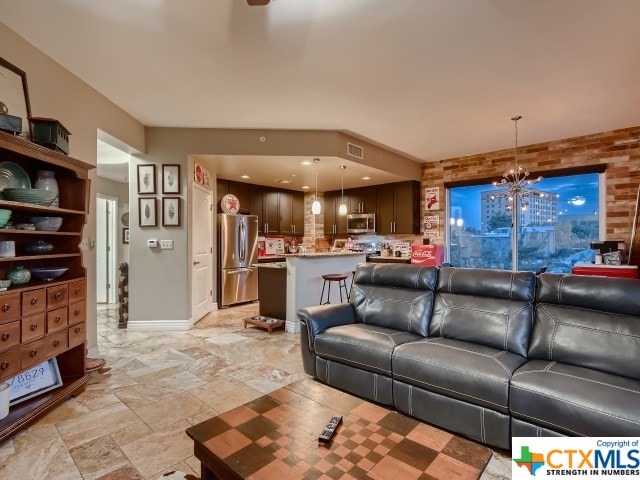 living room featuring a chandelier