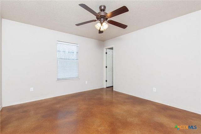 unfurnished room featuring a textured ceiling and a ceiling fan