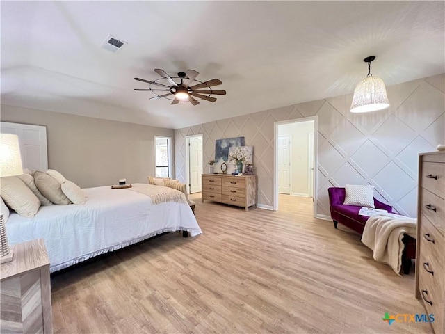 101 Biltmore Dr, Victoria, TX 77904 - bedroom with light wood-style flooring and a ceiling fan