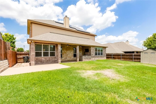 2508 Mugho Dr, Harker Heights, TX 76548 - rear view of house featuring a patio area, solar panels, a shed, and a fenced backyard