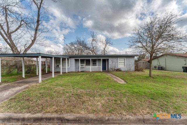 view of front of property featuring central AC, a carport, a porch, and a front lawn